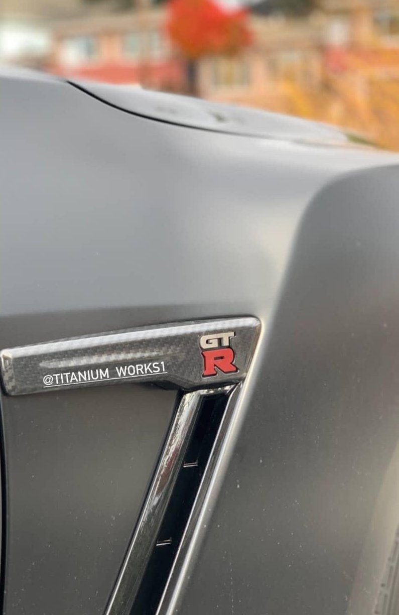 Nissan GTR R35 fender badge inserts – Titanium Works